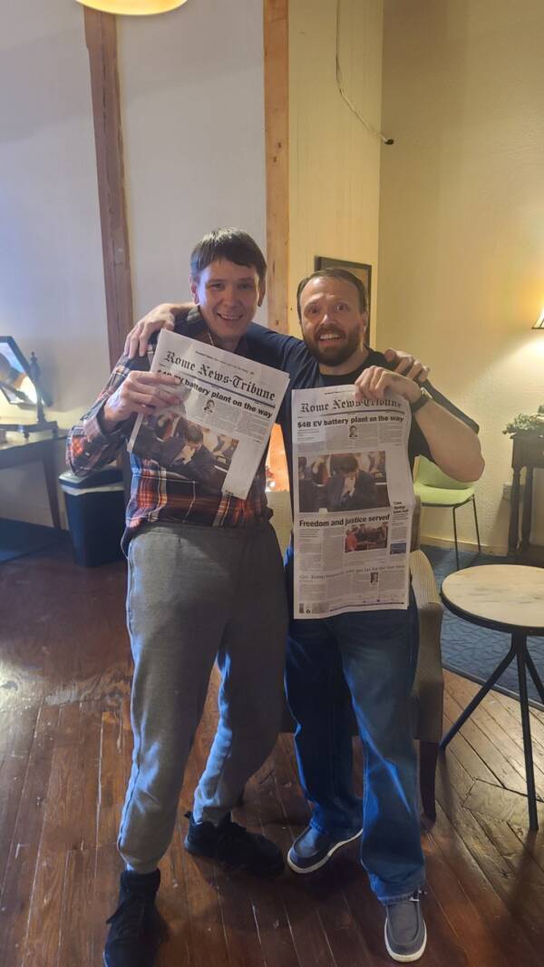 Storey And Clark With Newspapers