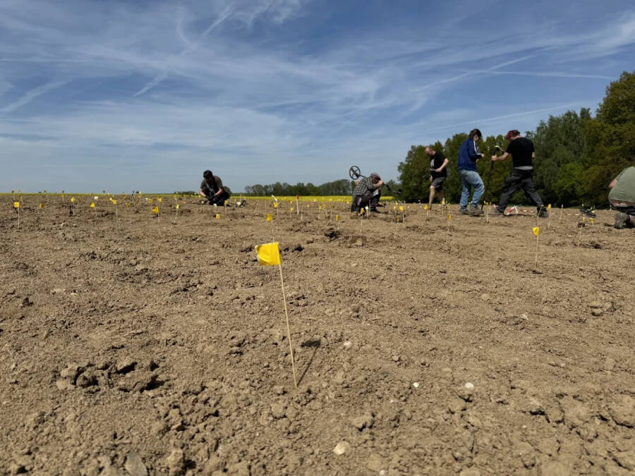 Archaeologists Inspect Field