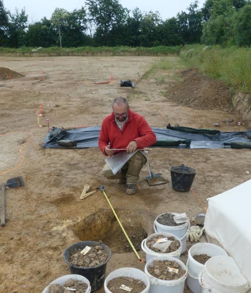 Archaeologist Taking Samples In Pace France