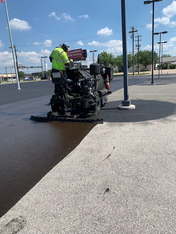 Asphalt Sealcoating & Striping Chevrolet Dealership in Marble Falls, TX