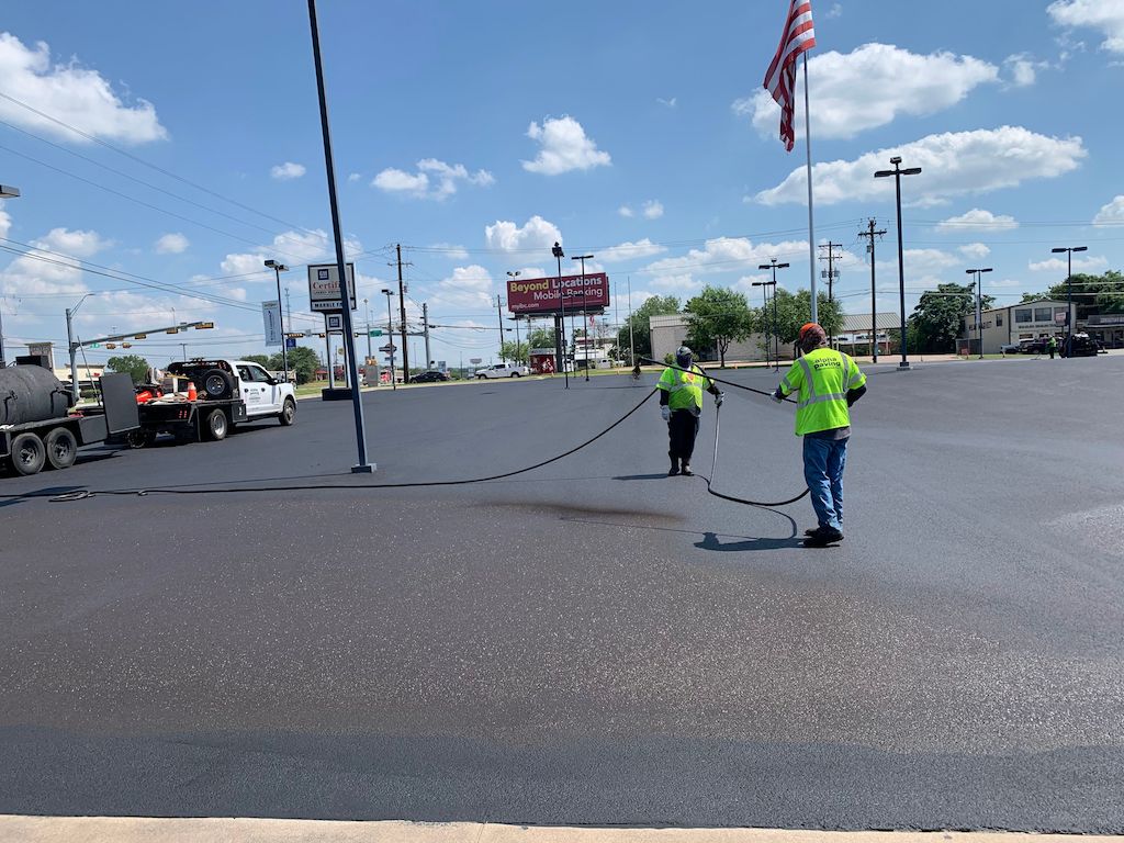 Asphalt Sealcoating & Striping Chevrolet Dealership in Marble Falls, TX