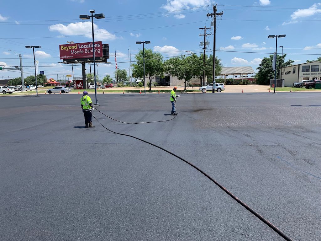 Asphalt Sealcoating & Striping Chevrolet Dealership in Marble Falls, TX