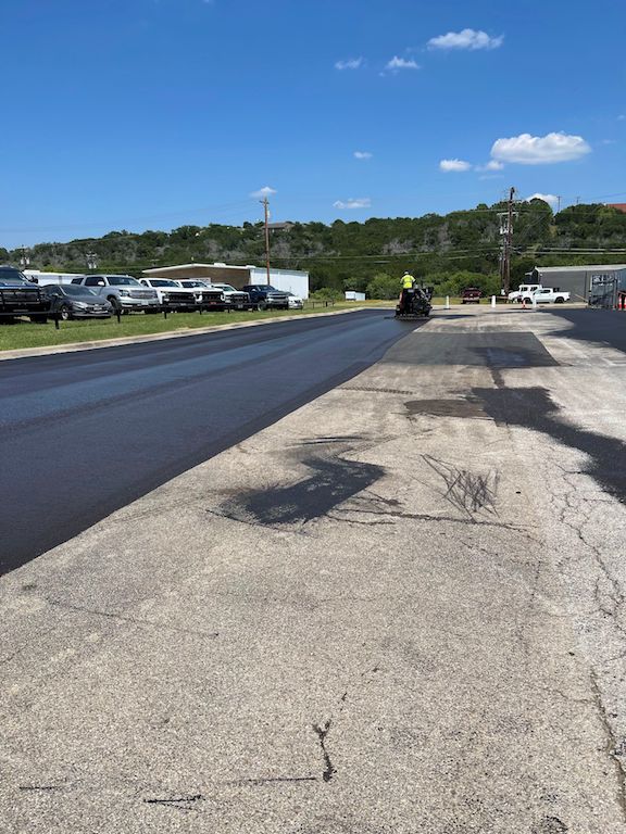 Asphalt Sealcoating & Striping Chevrolet Dealership in Marble Falls, TX