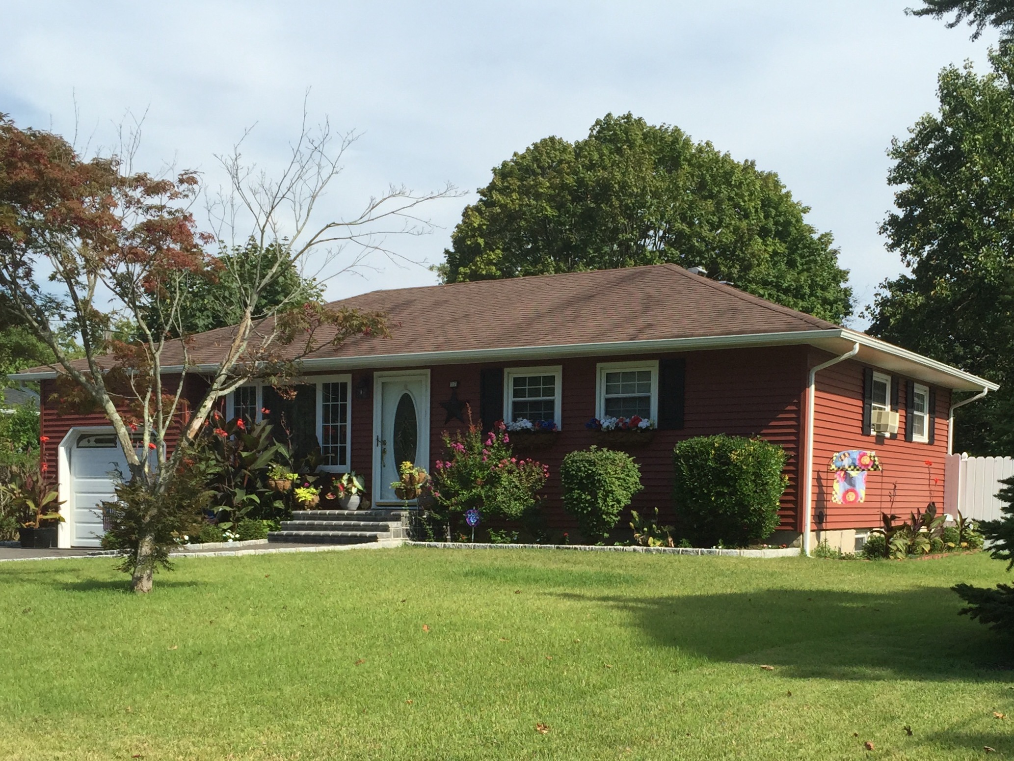 Oakdale Vinyl Siding in Autumn Red Alpha Windows & Siding