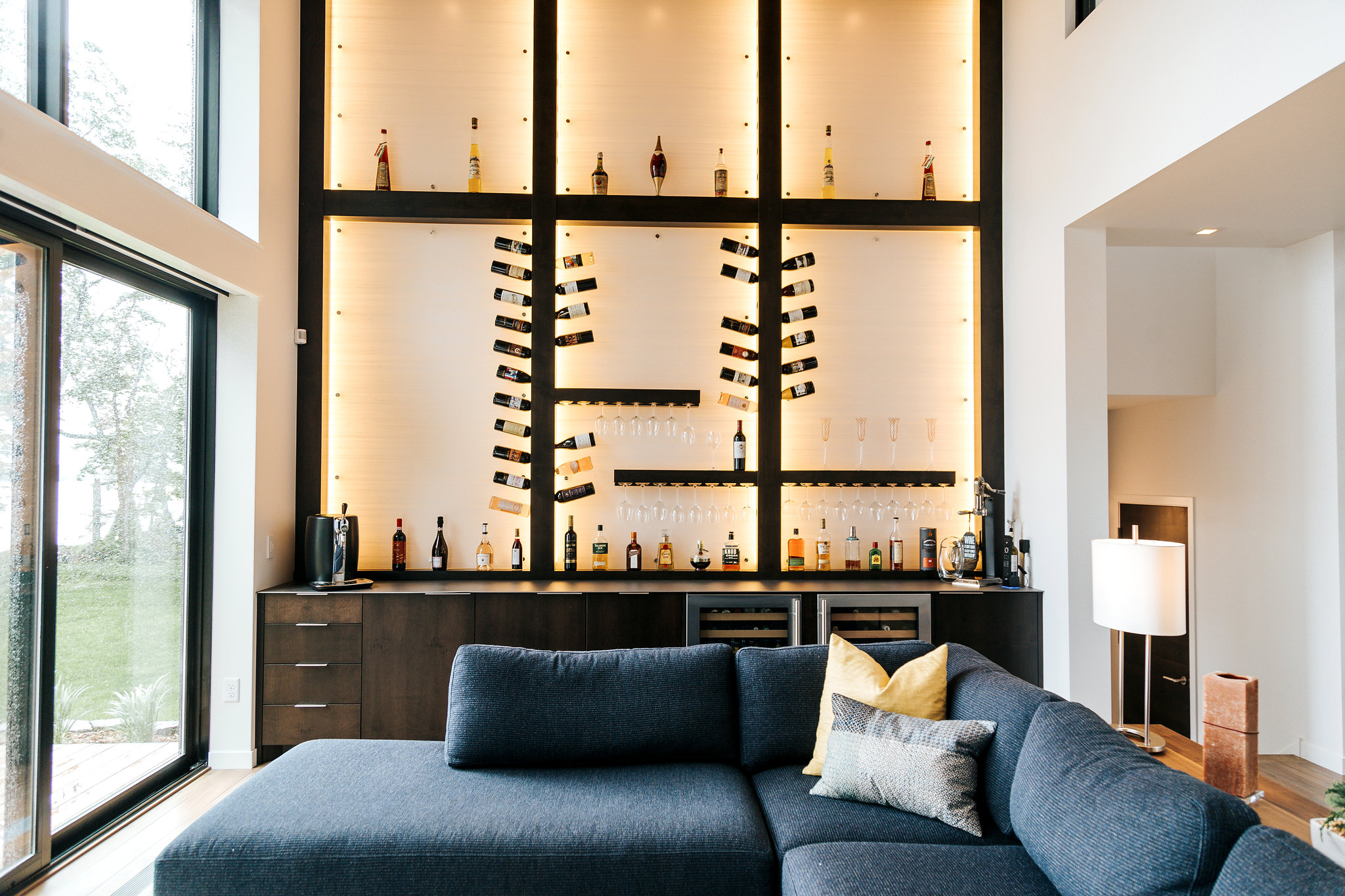 Modern Frameless Alder bar with unique custom wine bottle holder