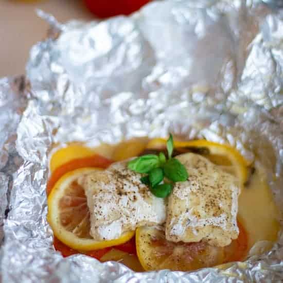 Baked Cod in Foil with Tomatoes, Potatoes & Lemon always use butter