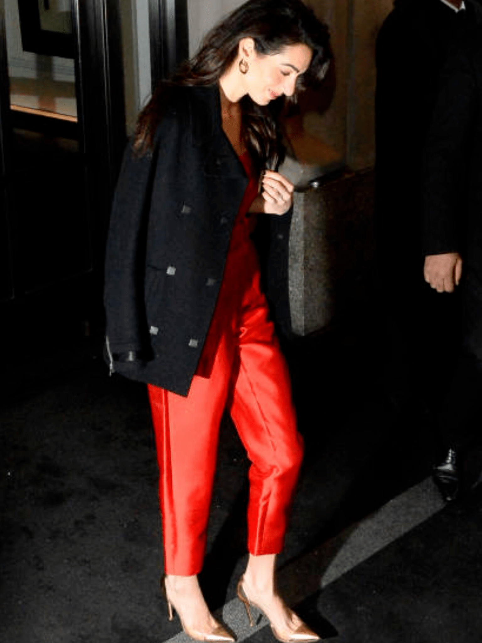 Amal Clooney Stuns in a Red Jumpsuit by Sergio Hudson at Meghan Markle