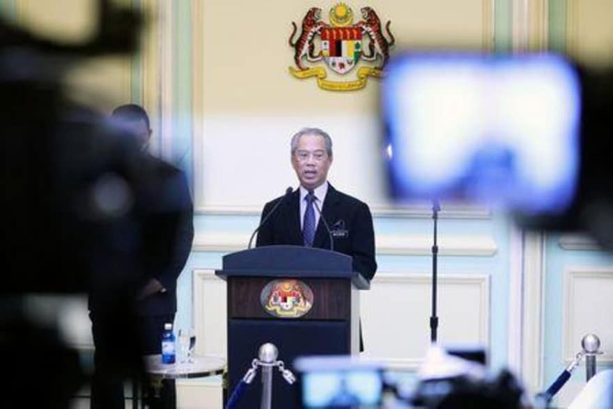 Malaysia's Prime Minister Muhyiddin Yassin speaks during his