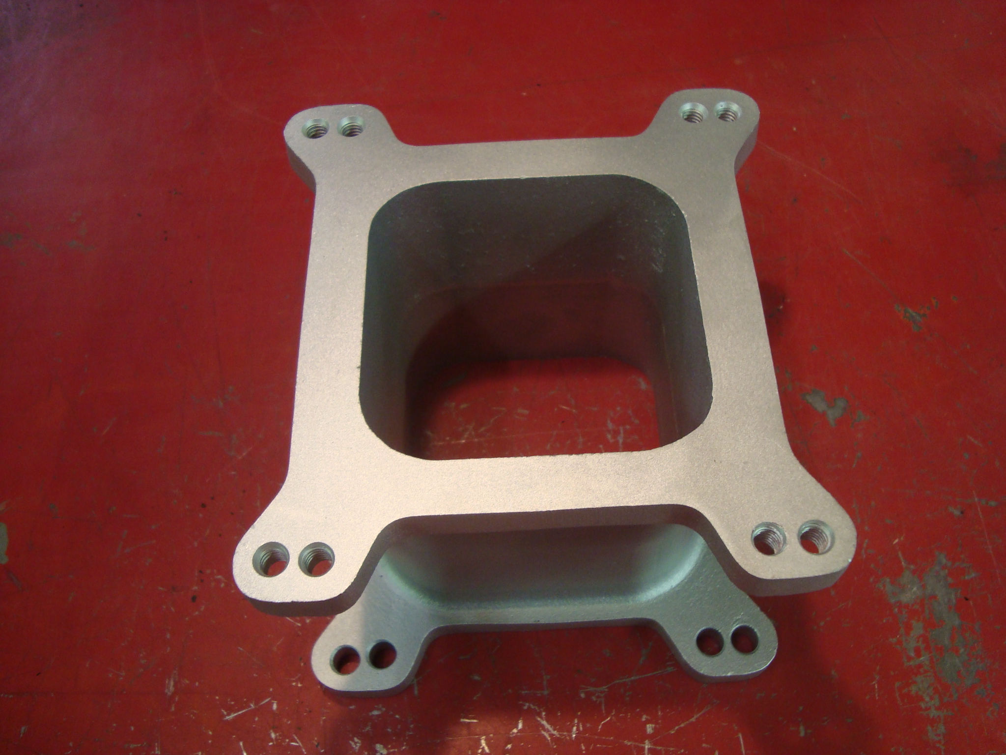 Carburetor, intake manifold, plenum, spacer. Danny L Sharer, dba Down