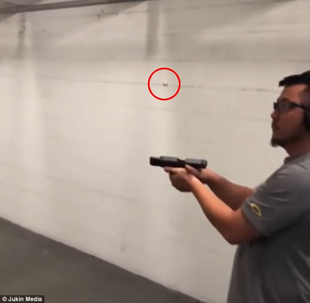 Man Catches Tossed Bullet With His Gun