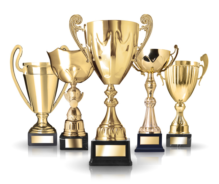 Set of golden trophies. Isolated on white background AMIC