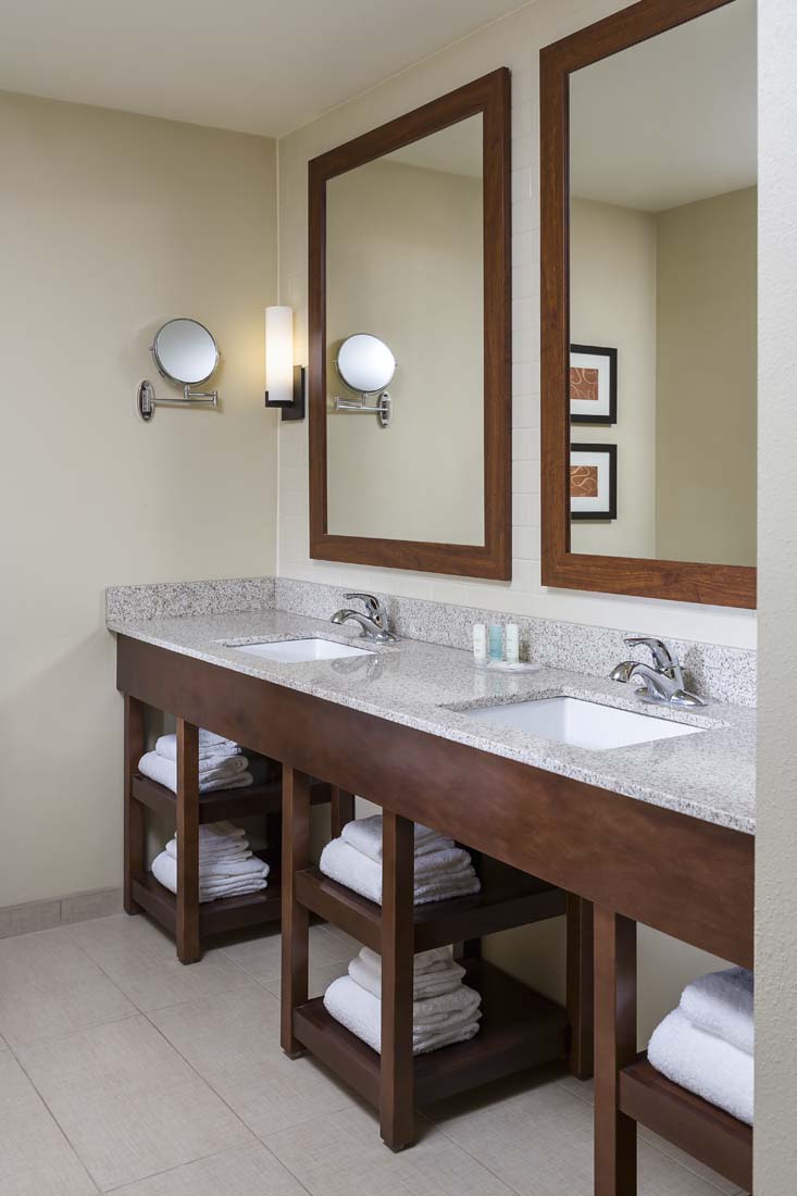 Double sink vanity in hotel bathroom Andrea Rugg Photography