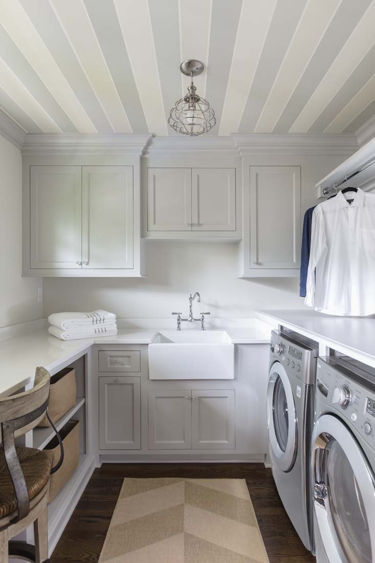 Beautiful gray laundry room with striped ceiling Andrea Rugg Photography