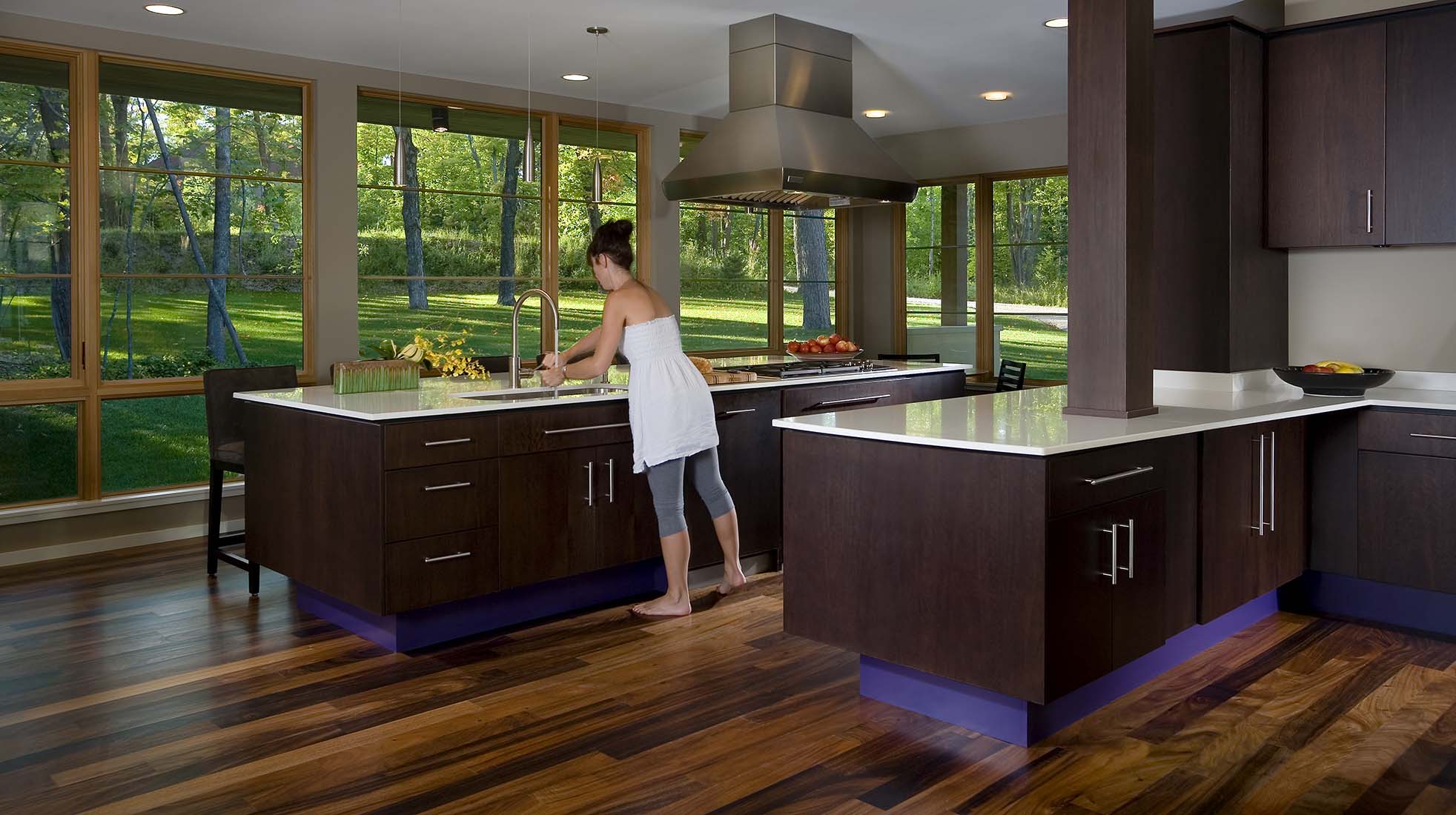 Modern kitchen with dark and beautiful view of green forest