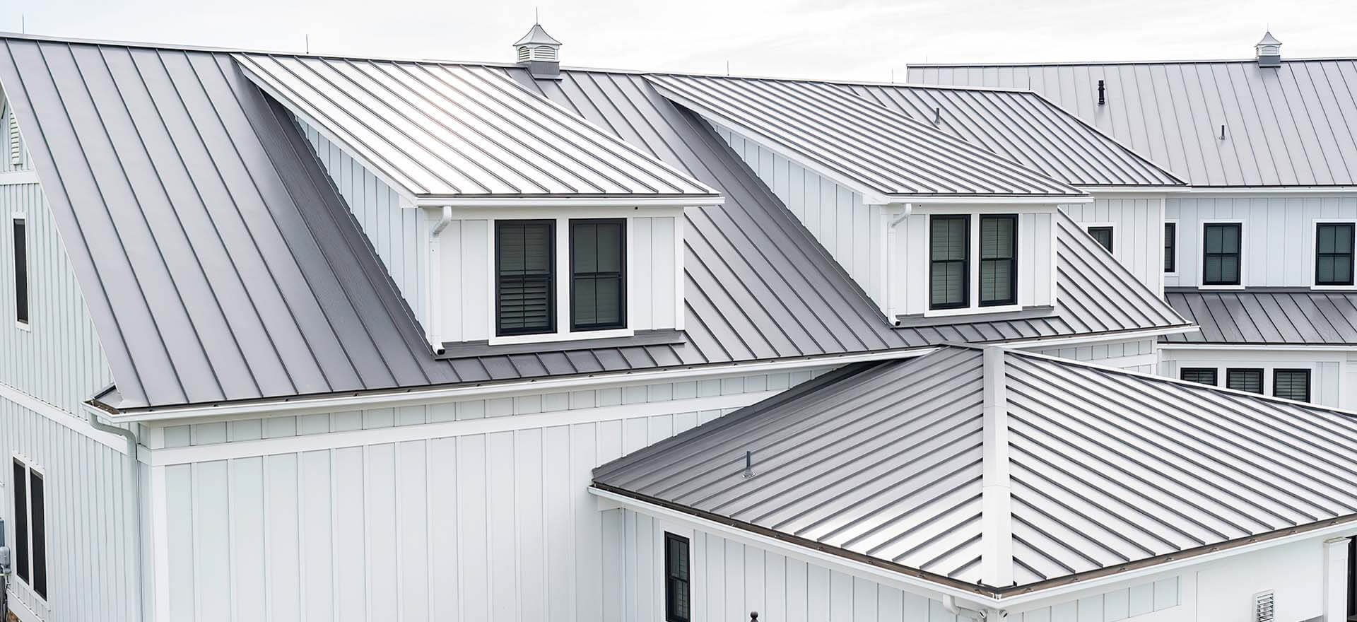 SentriClad Metal Slate Gray & Andrews Roofing’s Rapid Rain 56X Gutter