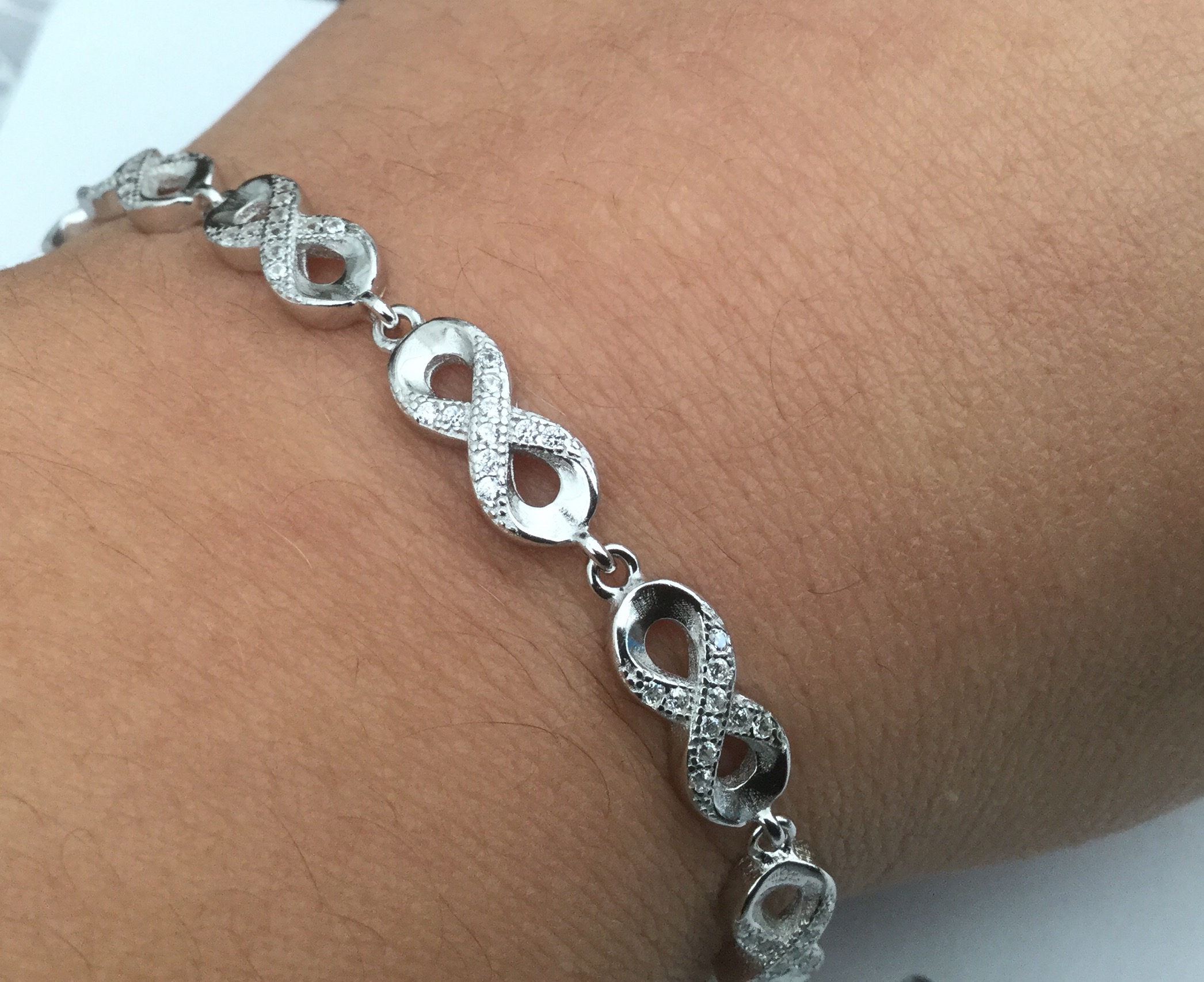 Sterling silver 925 infinity bracelet with cz stones Angel Jewelers