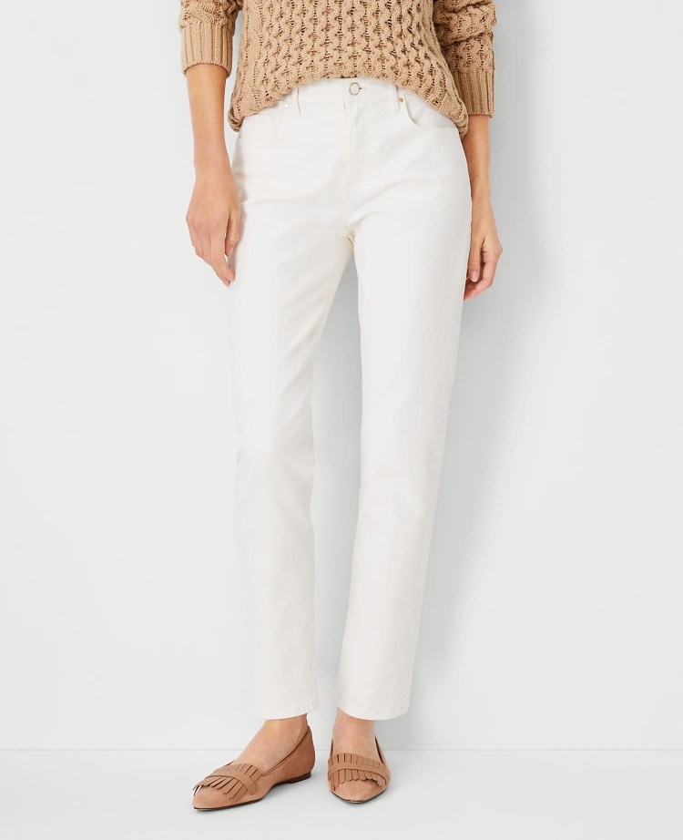 Petite Sculpting Pocket Mid Rise Tapered Jeans in Ivory