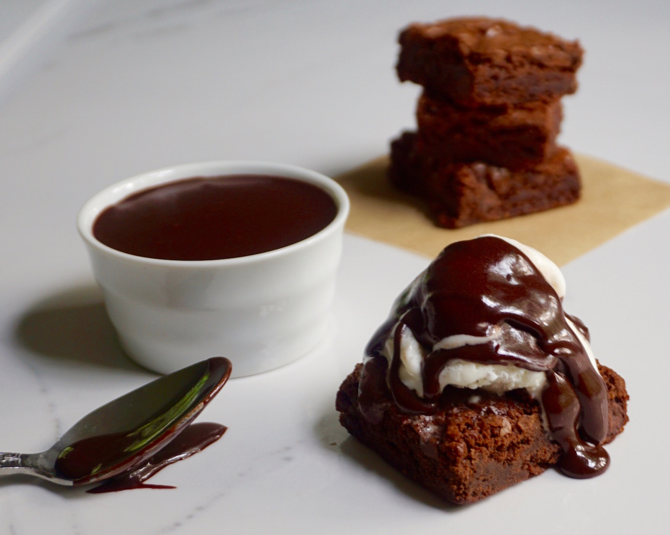 Hot fudge Sauce made from a few simple ingredients that is thick and rich.