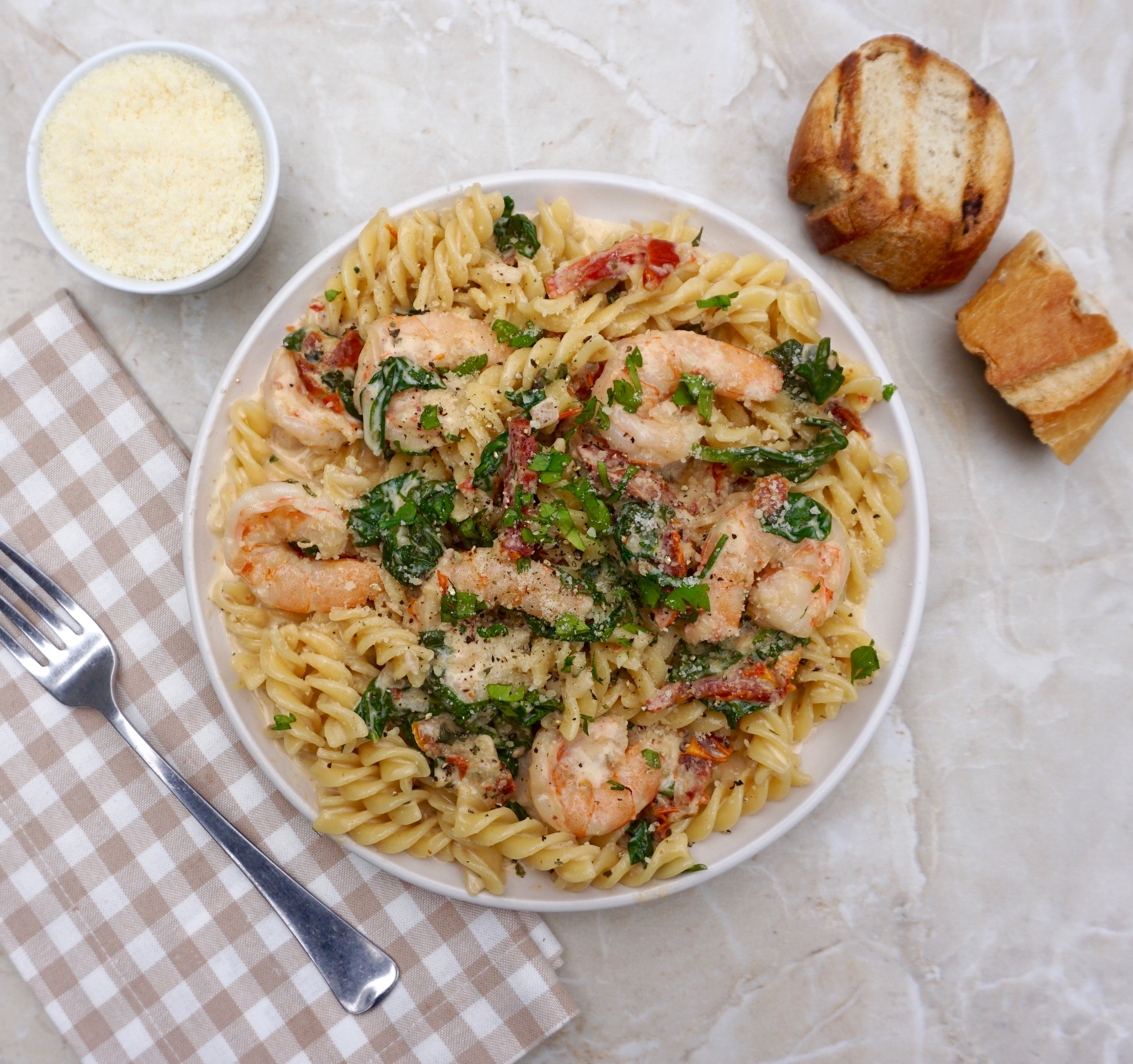 Creamy shrimp sauce with wine, sun dried tomatoes and