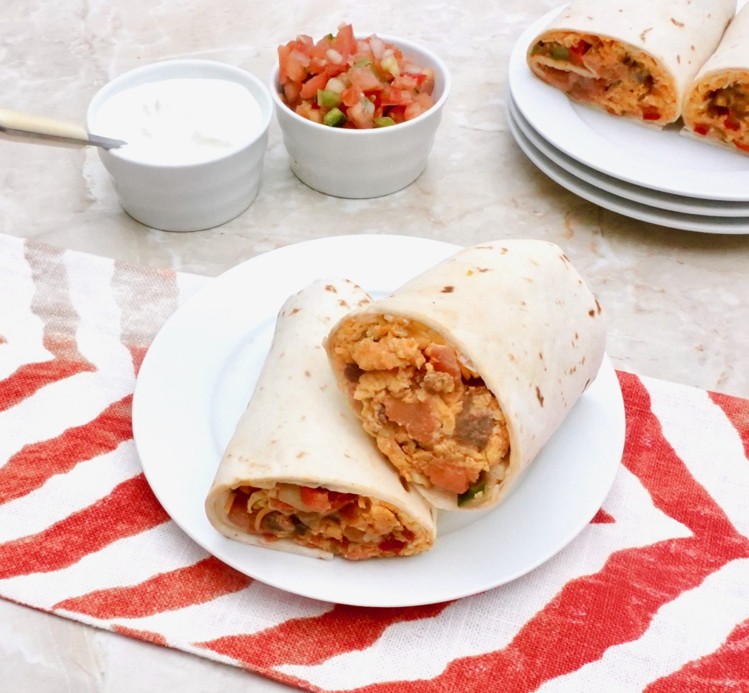 Chorizo Breakfast Burrito with eggs, black beans, salsa and cheese.
