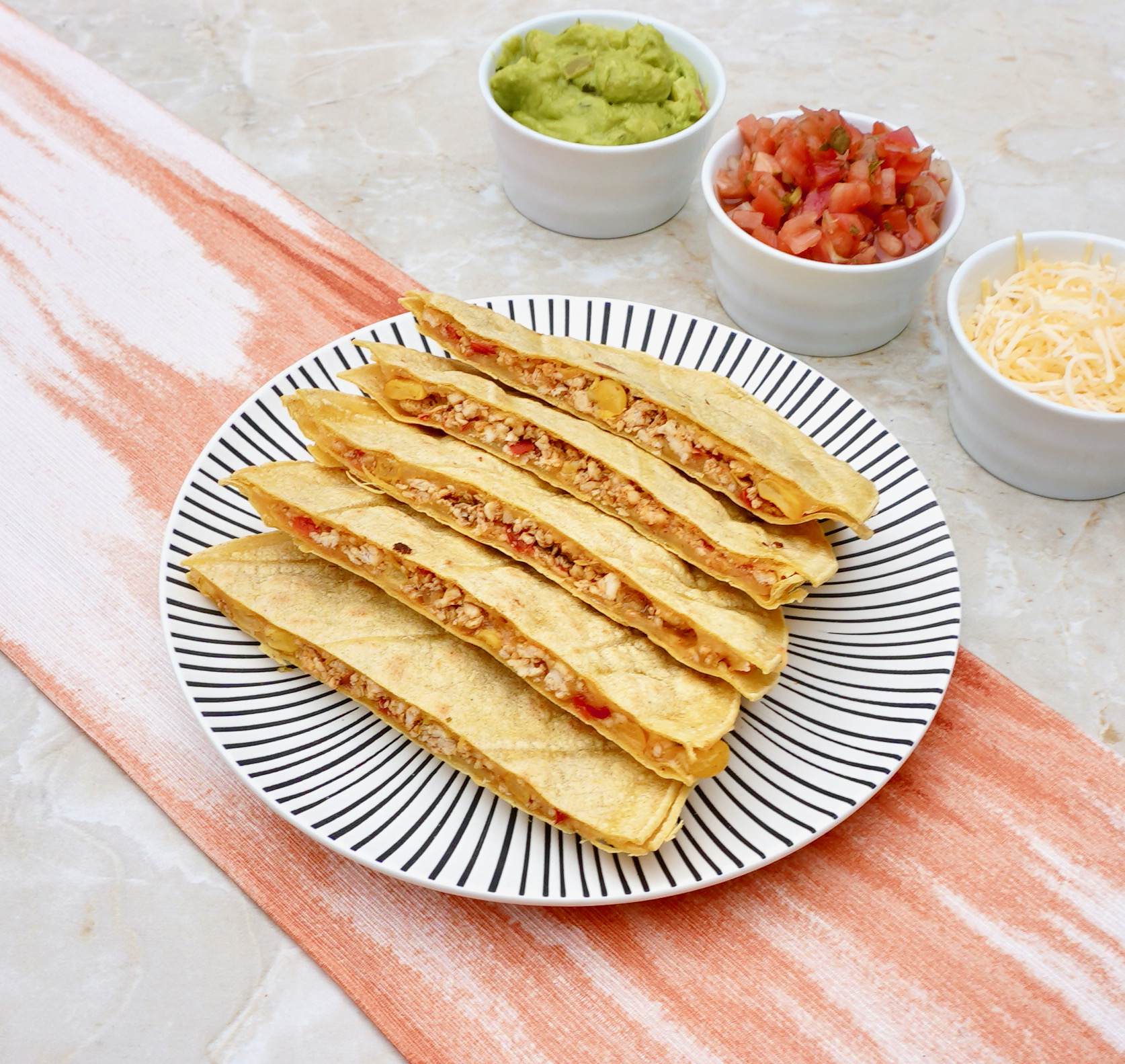 Corn Tortilla Quesadilla with cheesy chicken filling.