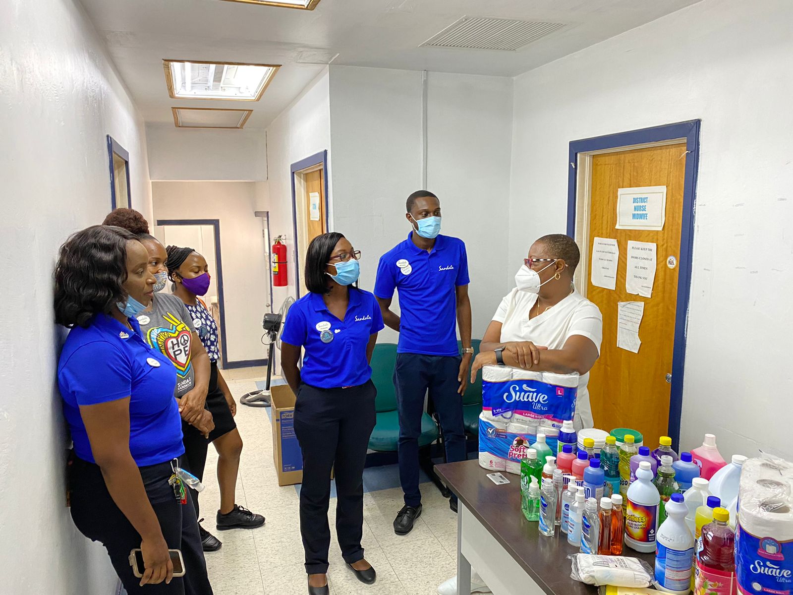 Sandals Team Members Gift Toiletries And Cleaning Supplies To Gray’s