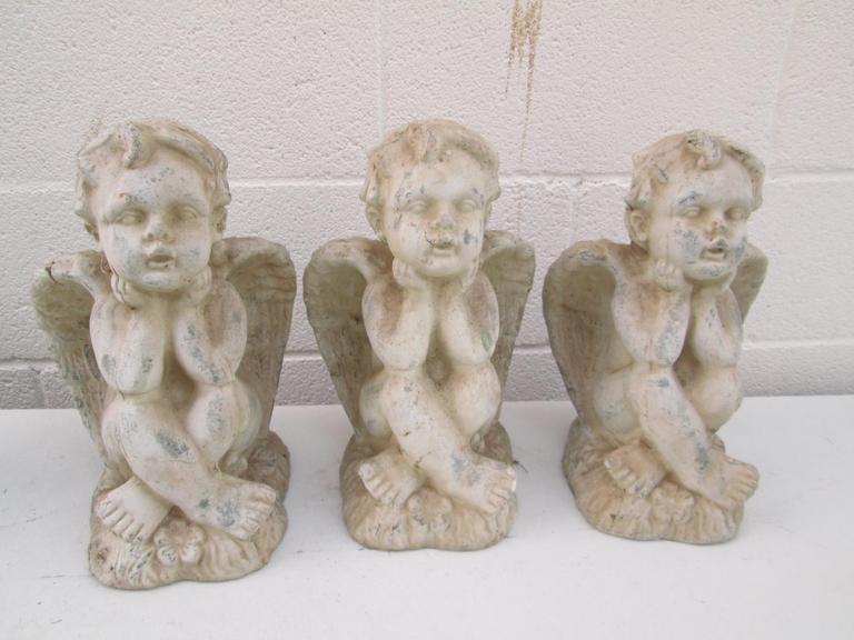 Auction Ohio Cherub Garden Statues