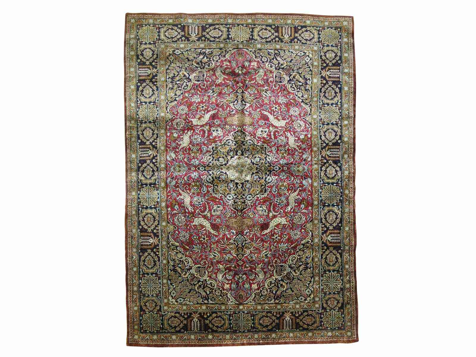 A genuine hand woven oriental rug Ghoum Silk