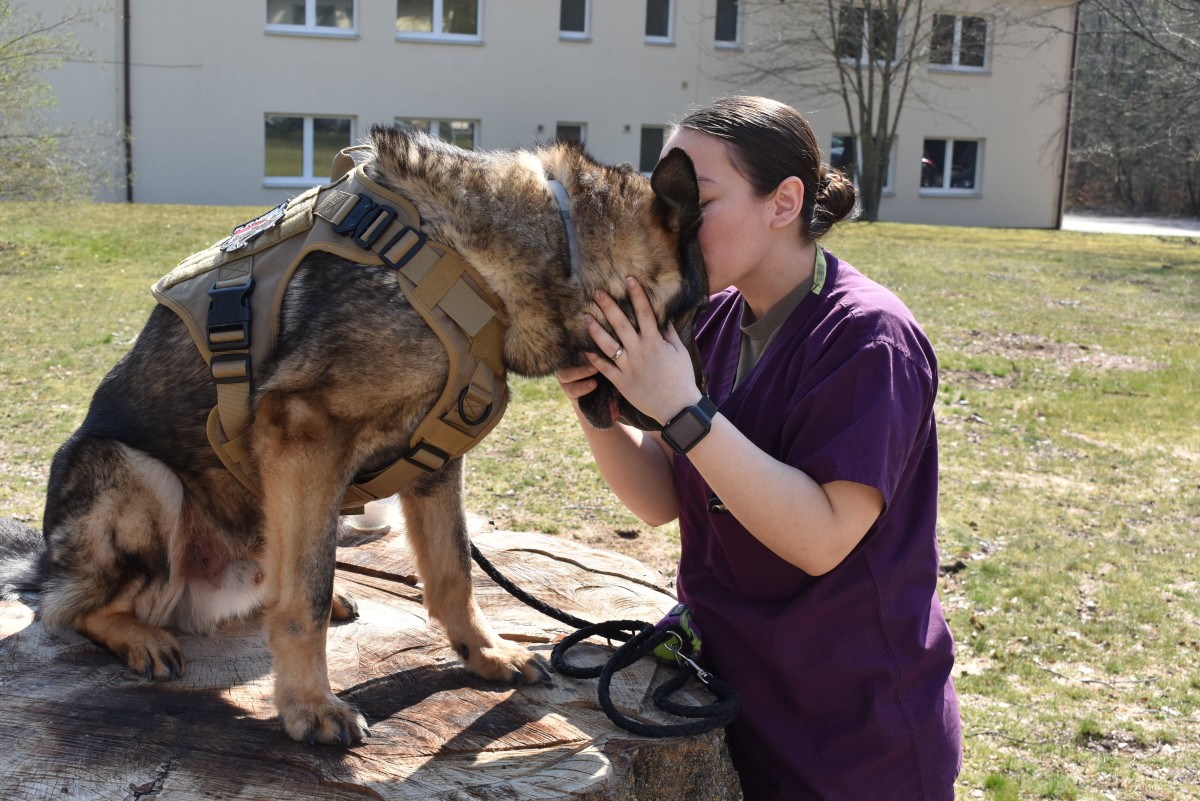Animal Care Specialist adopts retired Military Working Dog
