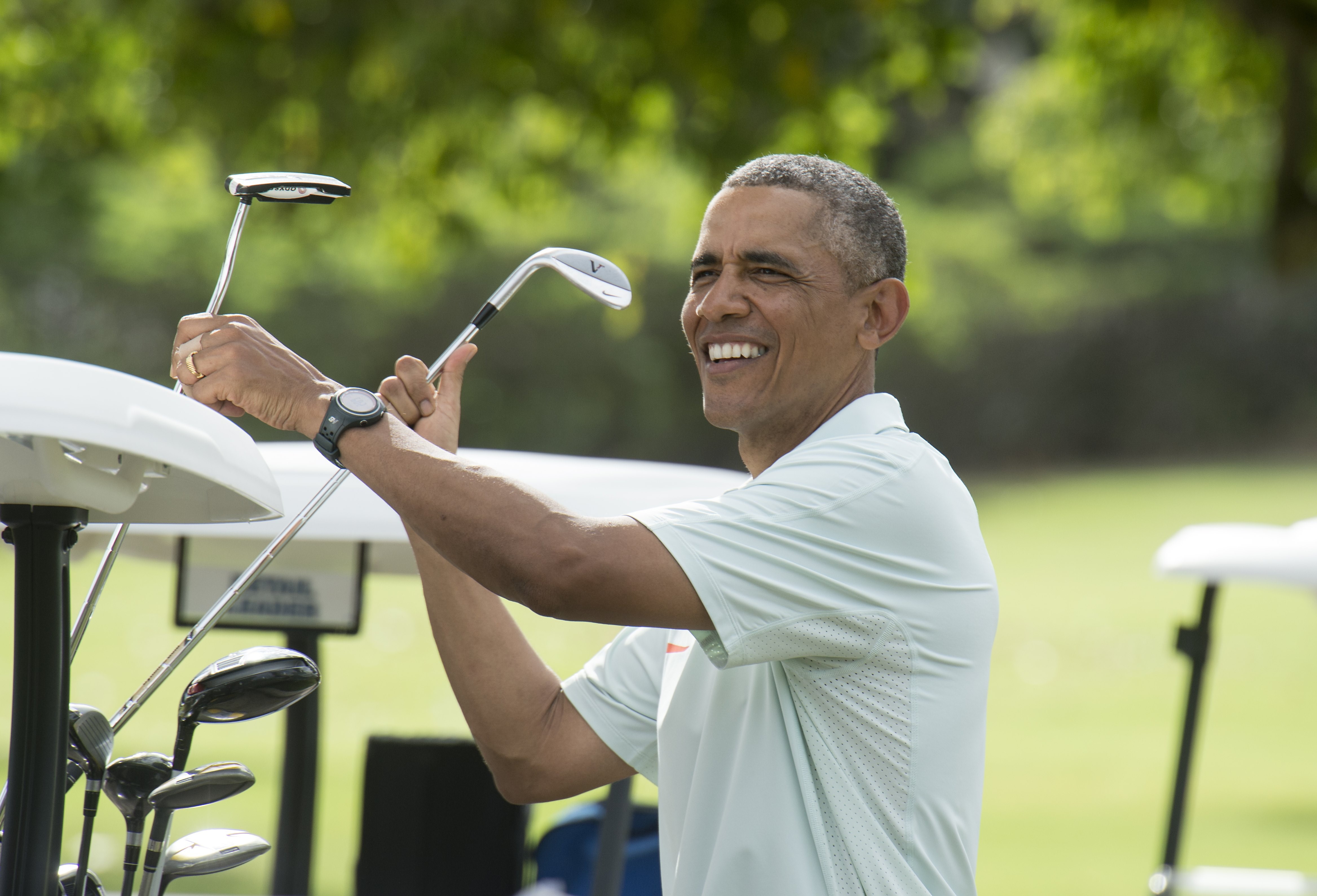 Obama President Golf Game Forces Couple to Move Wedding Day Before TIME