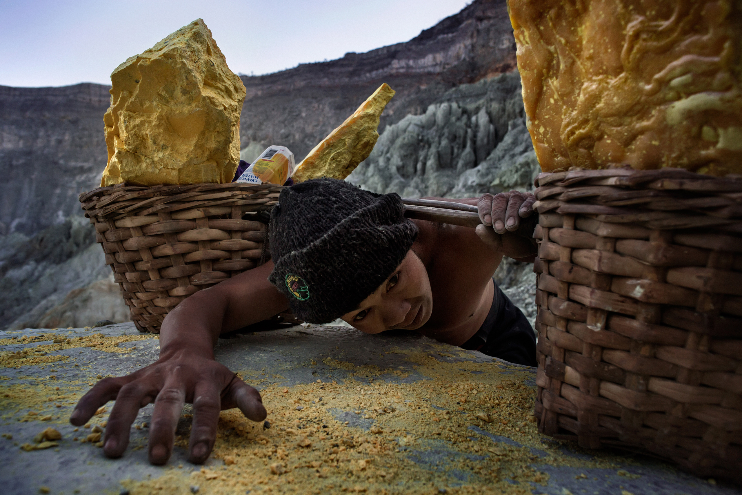 PHOTOS Meet the Sulfur Miners in Java, Indonesia Time