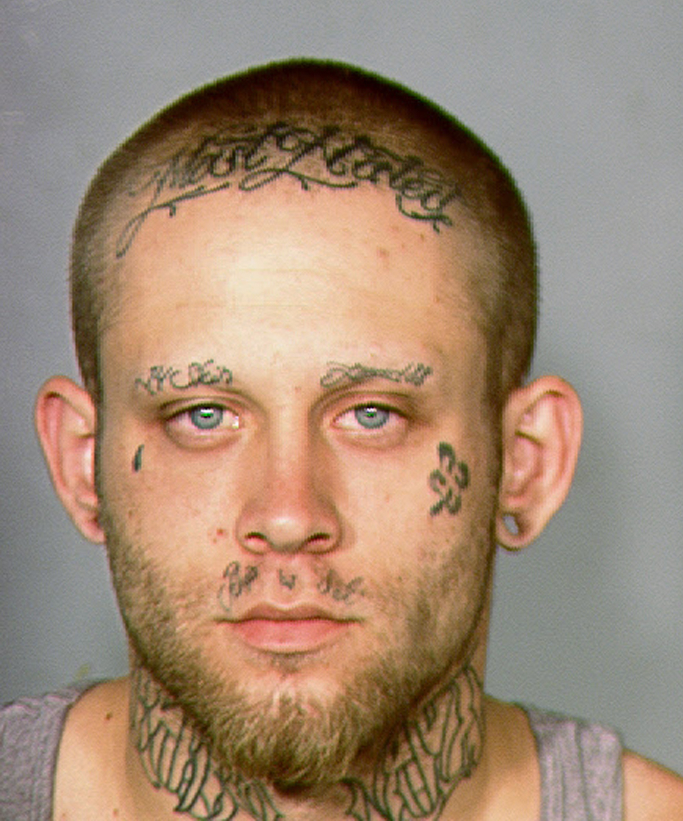 Nazi Tattoos Robbery Suspect Tattoos to Be Concealed Time