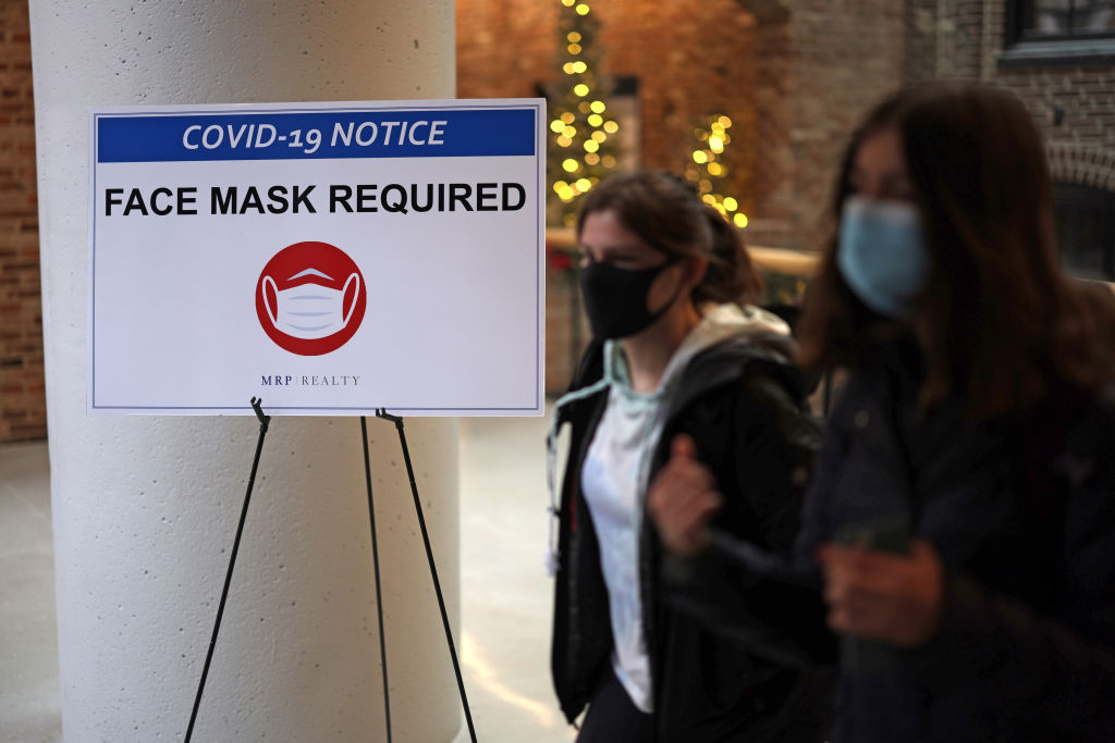 CDC Most Americans Don't Currently Need a Mask Indoors TIME