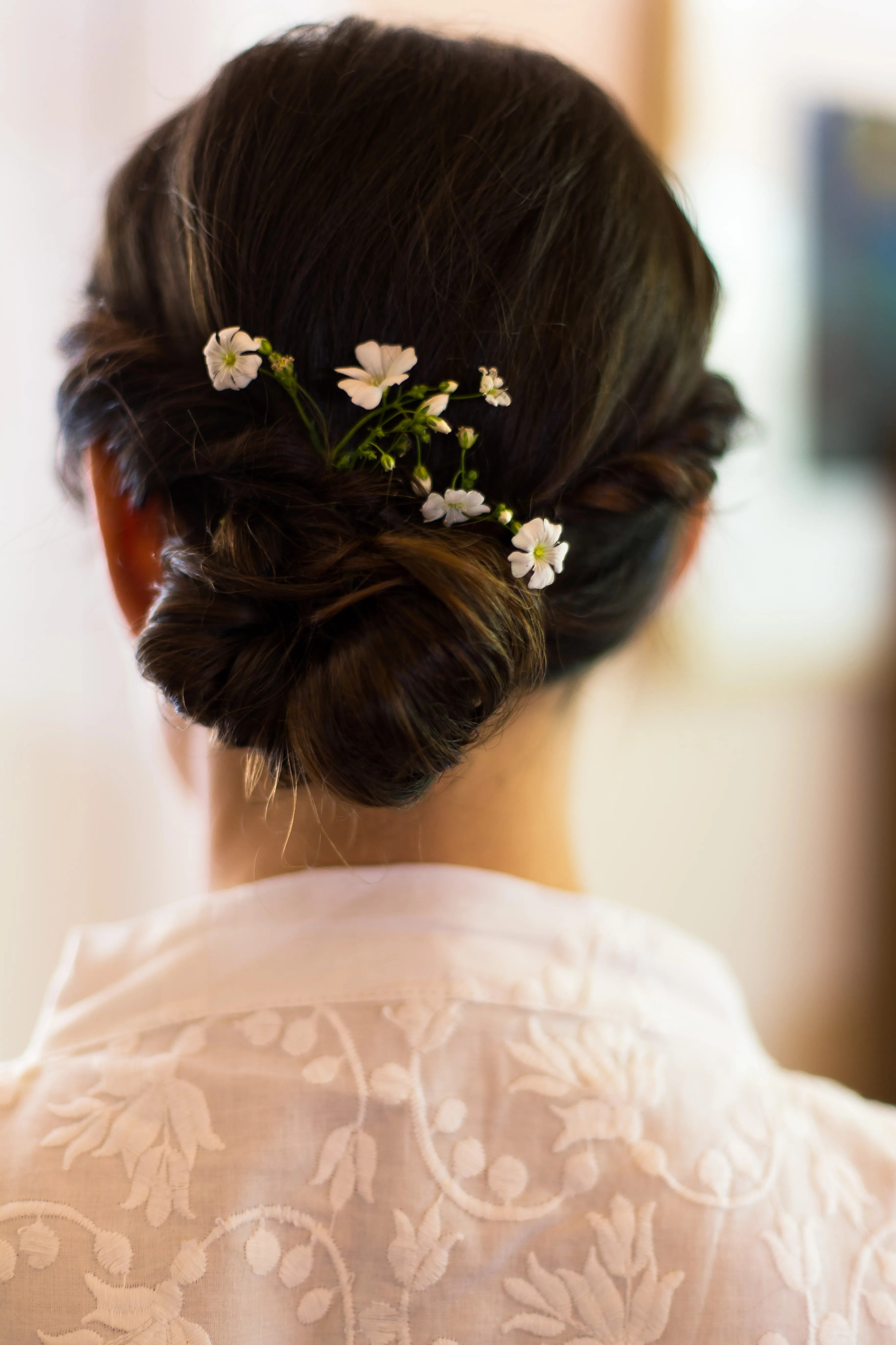 Small White Flowers in Updo Hairstyle