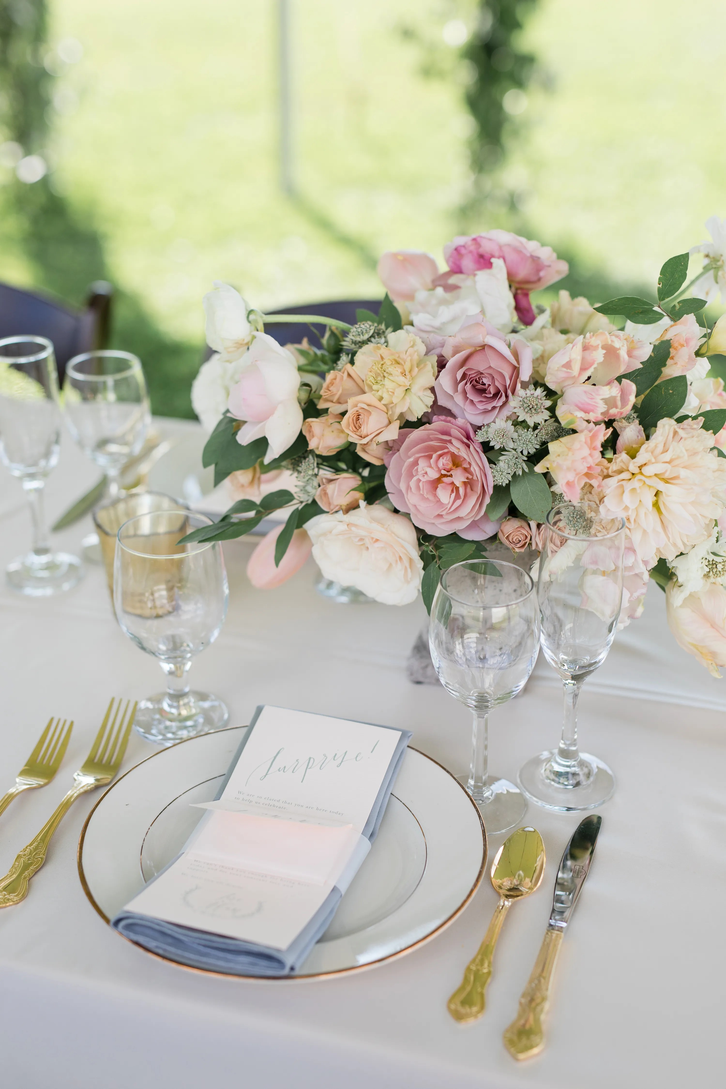 Elegant Place Setting with Romantic, Pastel Floral Centerpiece