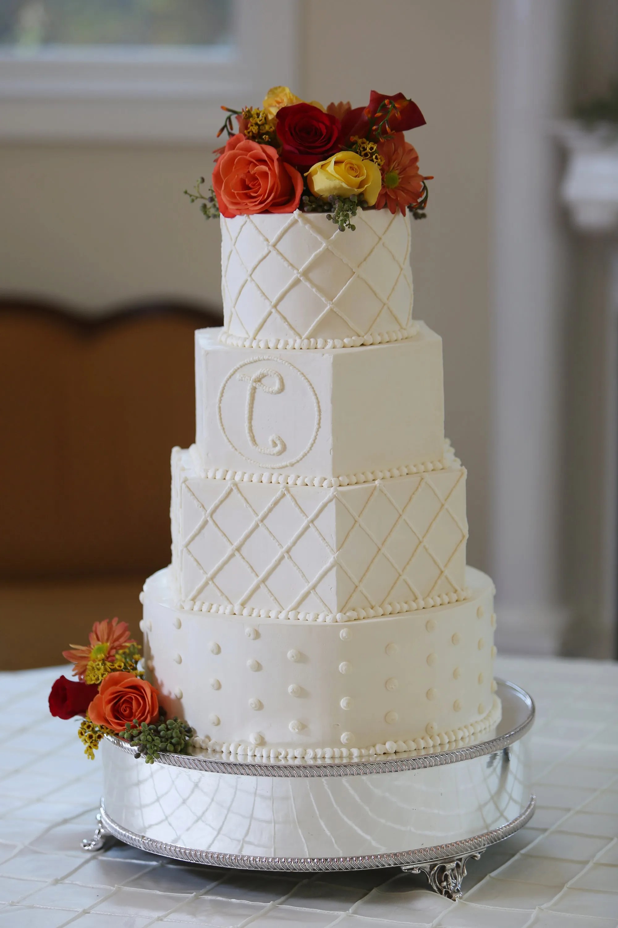 Hexagonal Wedding Cake With Fall Flower Topper