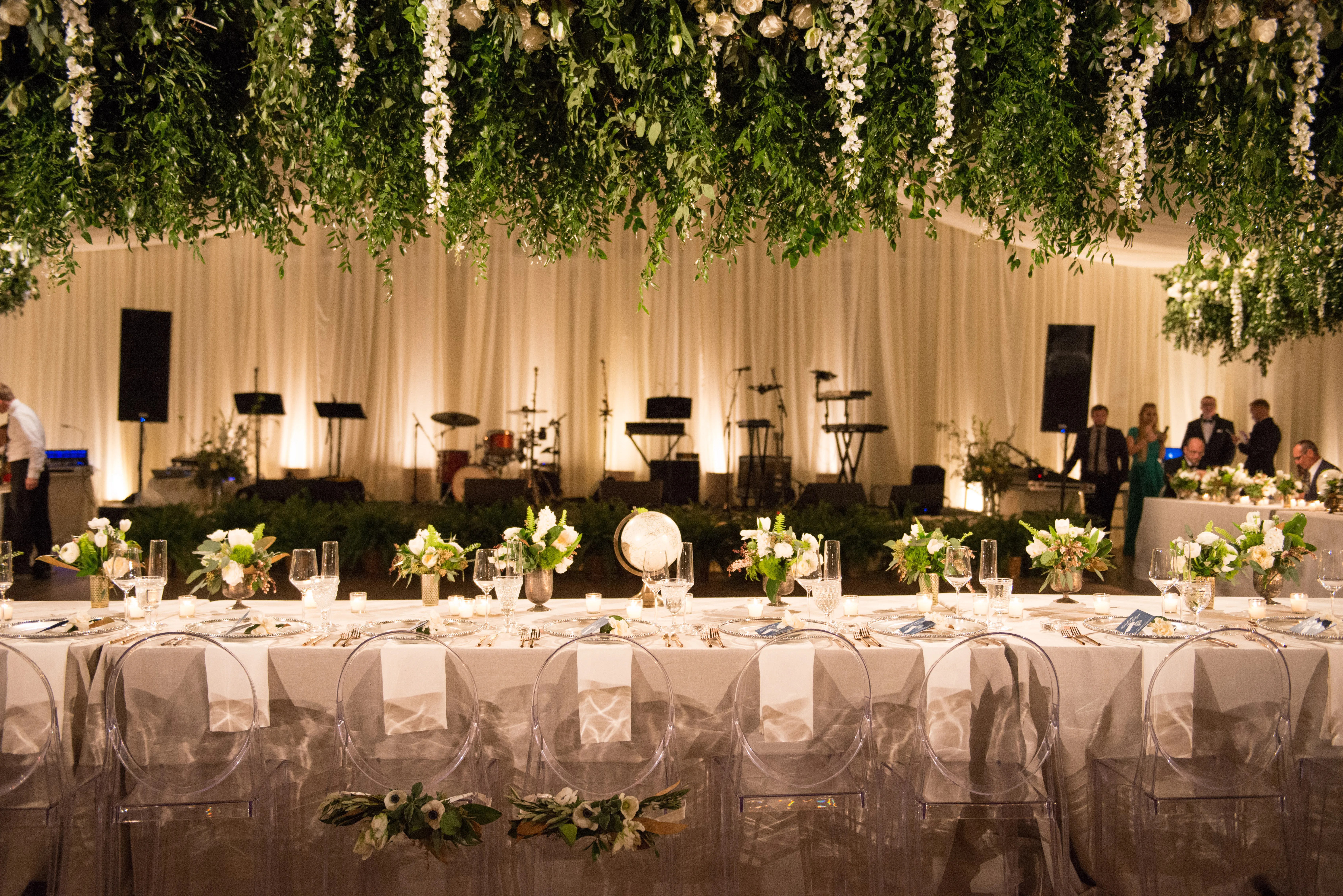 Greenery and Flowers Hanging From Ceiling