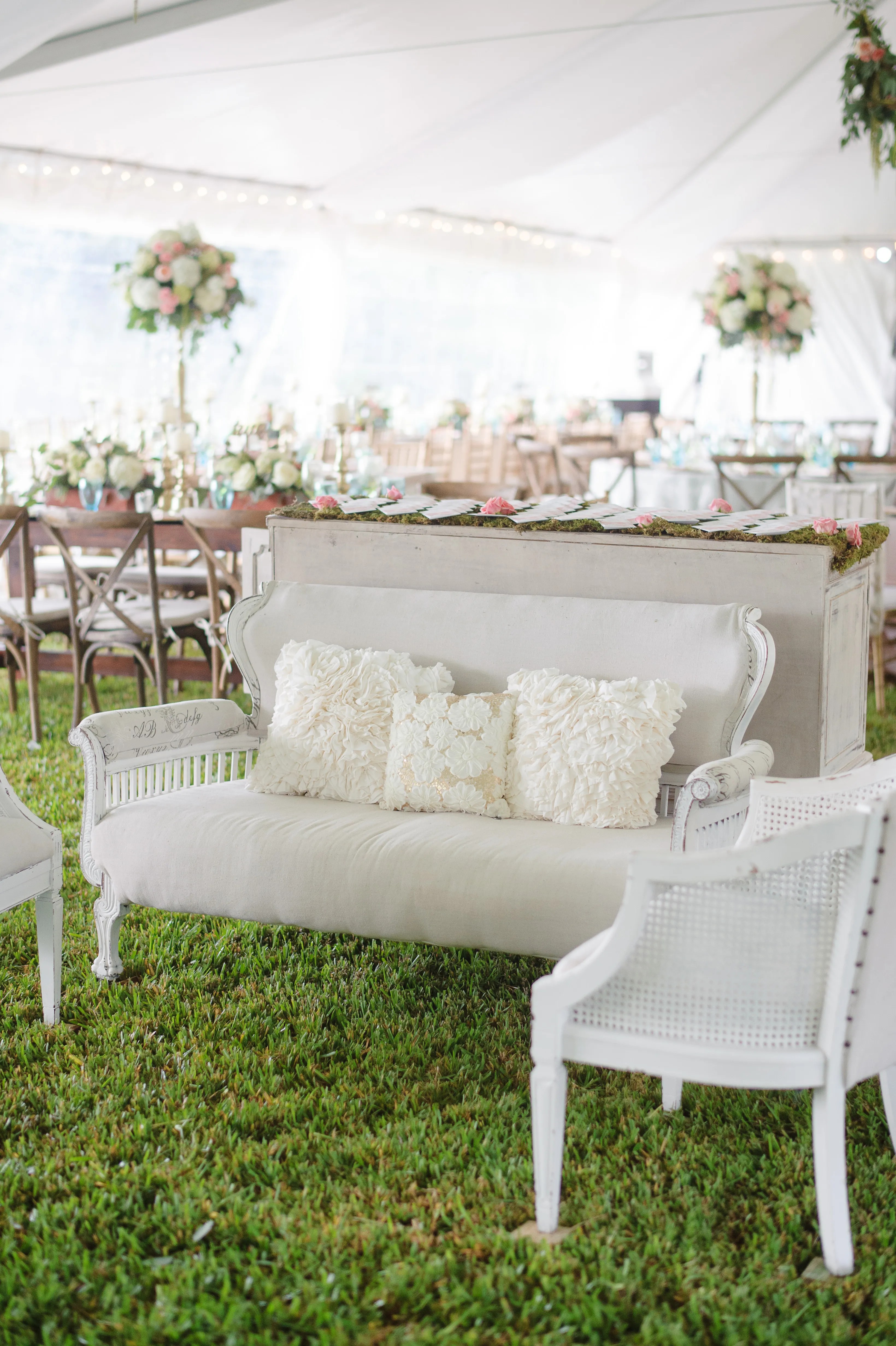 Vintage White Couch with Textured Pillows