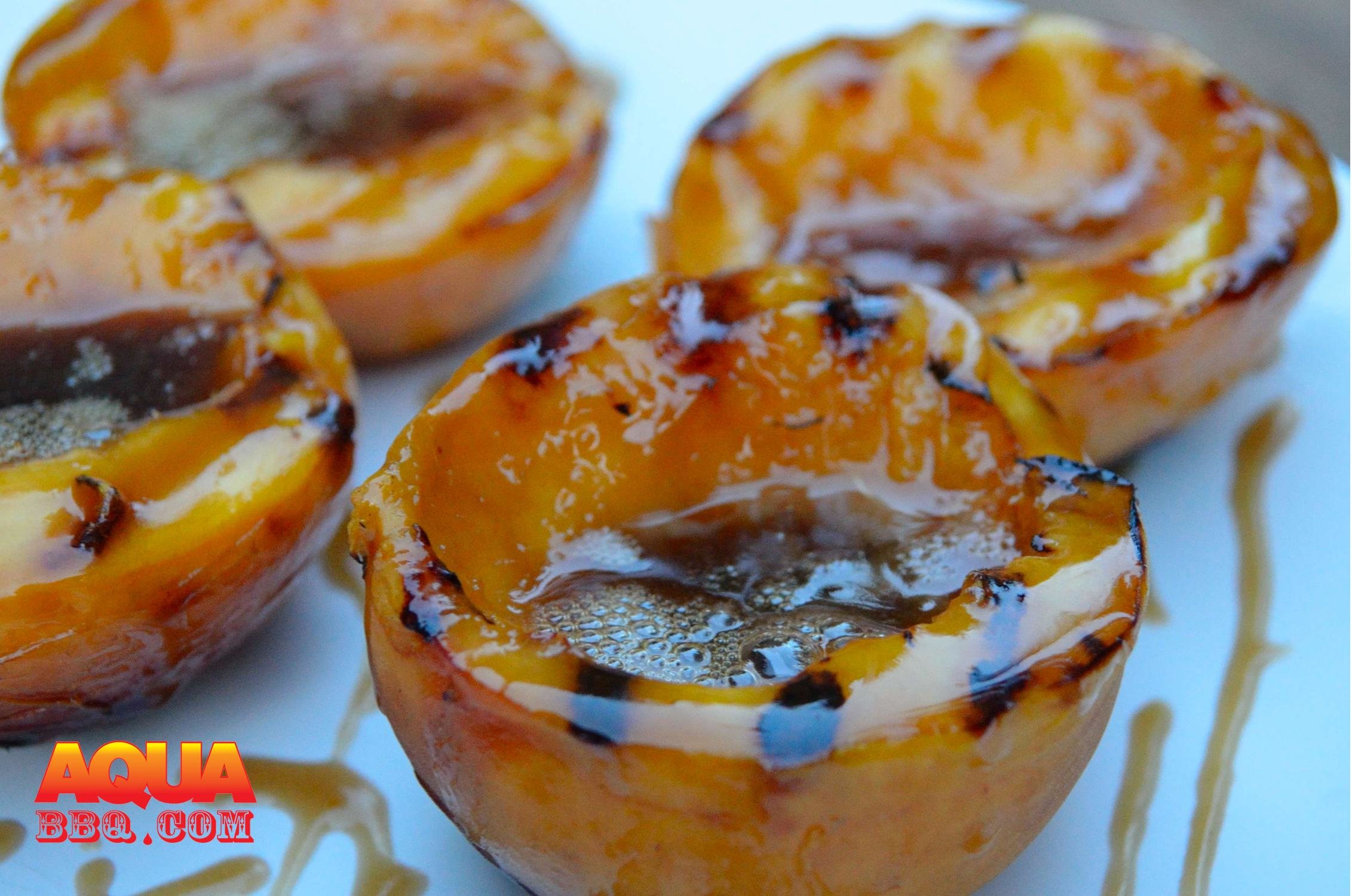 Grilled Peaches with Buttered Rum Sauce Primo Grills & Smokers Aqua BBQ