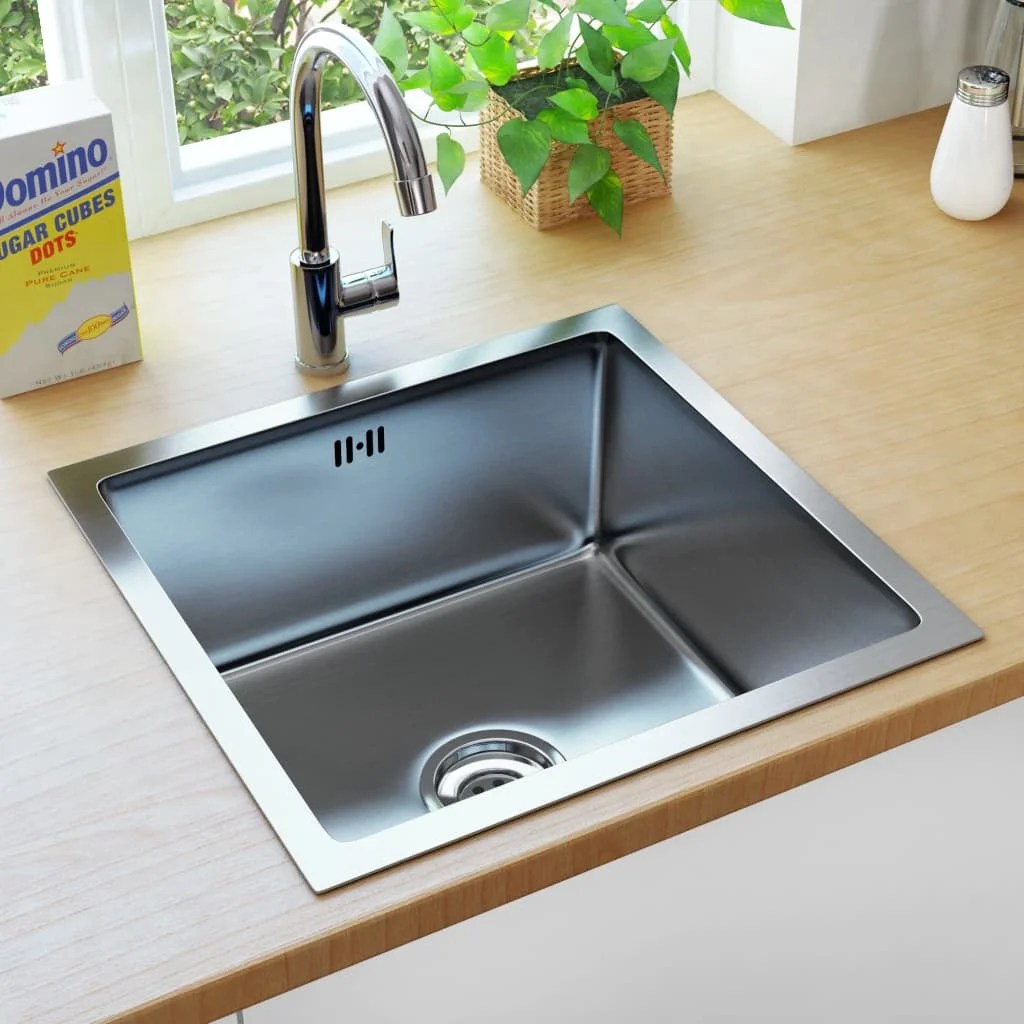 Where is a sink overflow hole placed? A Quartz Sink