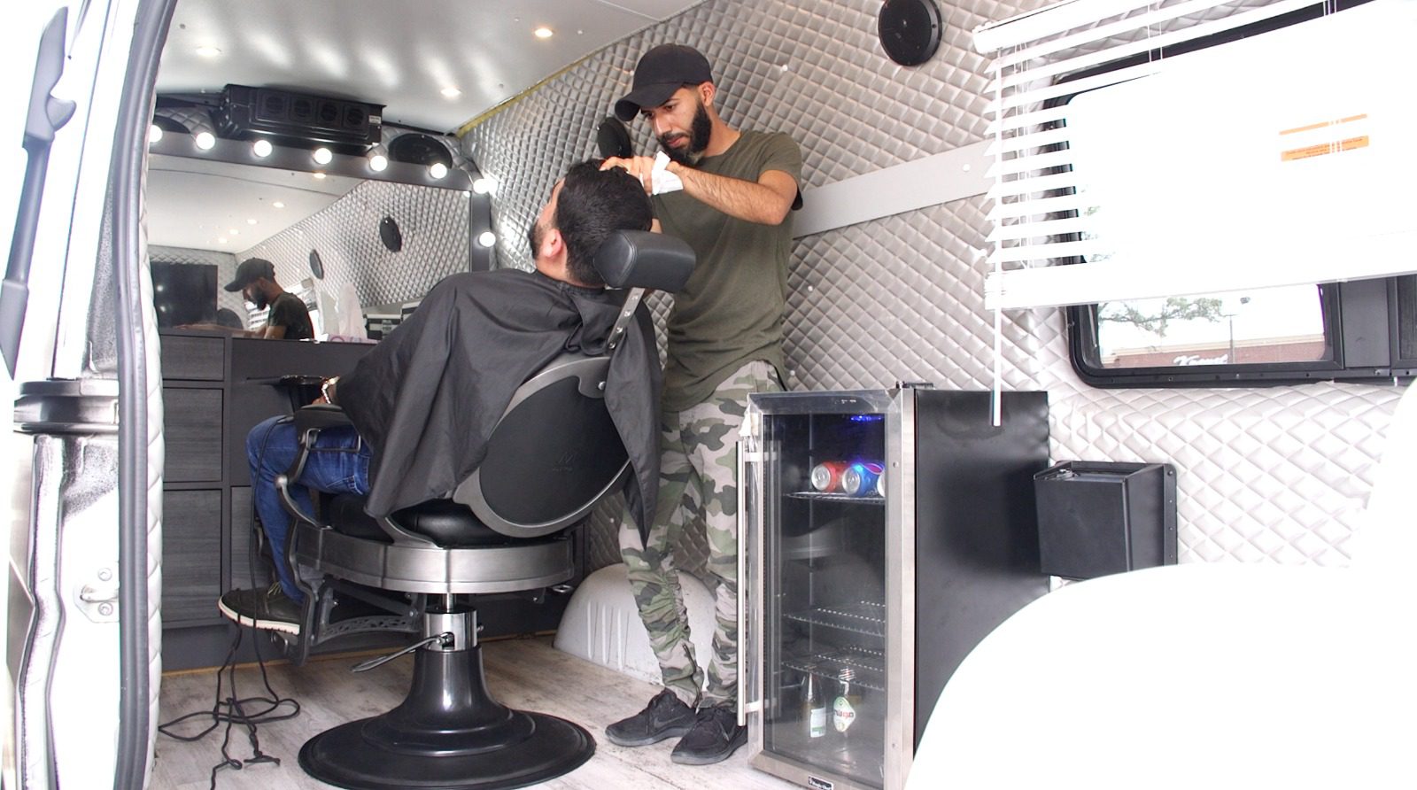 Iraqi immigrant brings innovative mobile barber business to Metro Detroit
