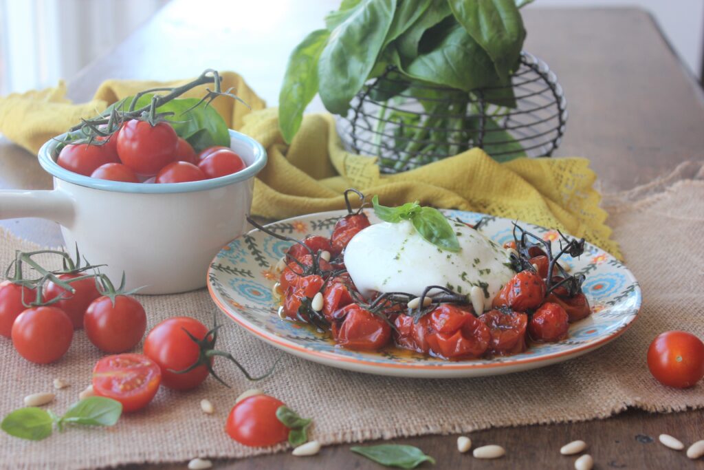 Burrata con cherry asados