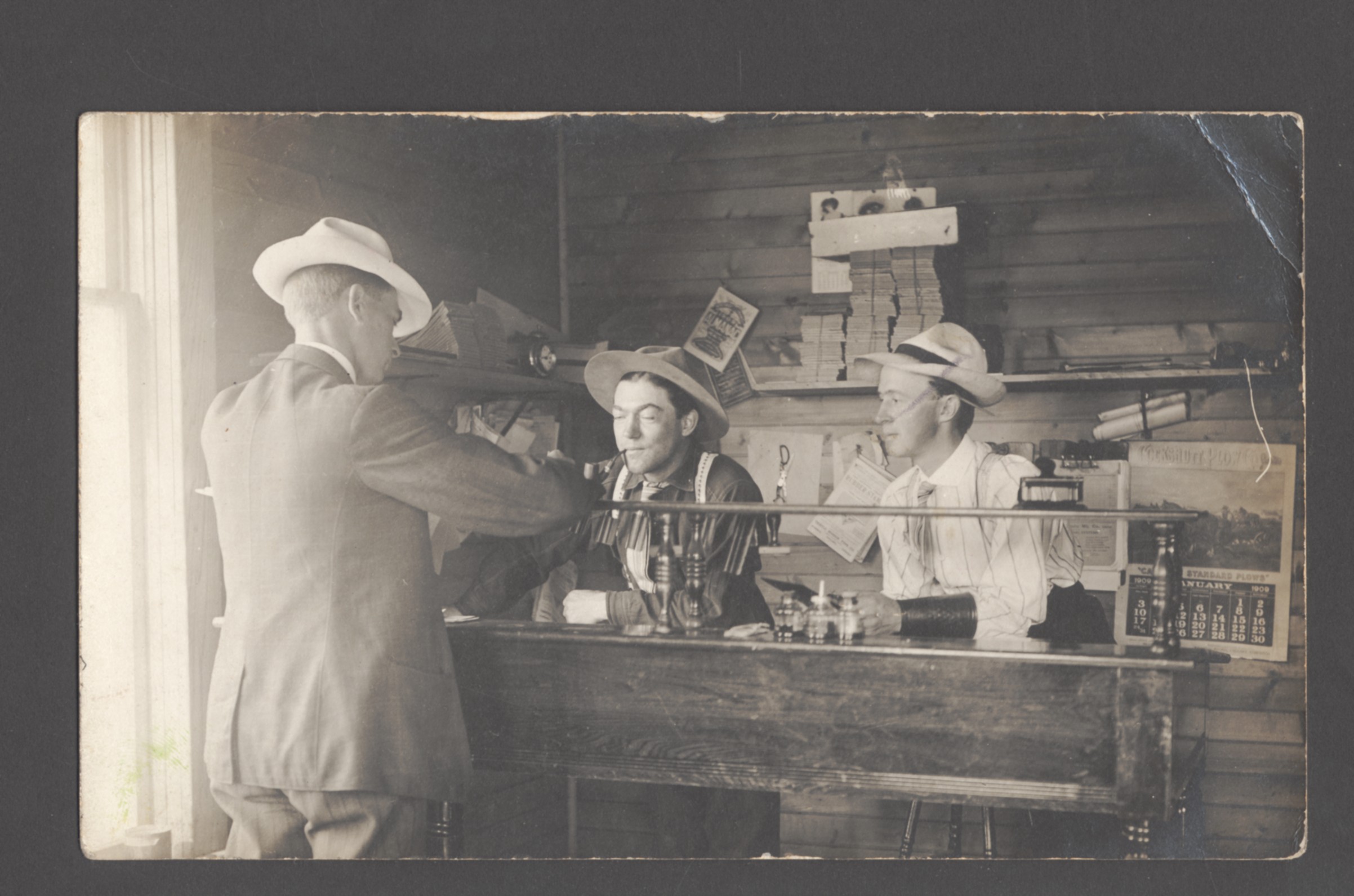 [Three men doing business in Kelliher, Saskatchewan] Free Download