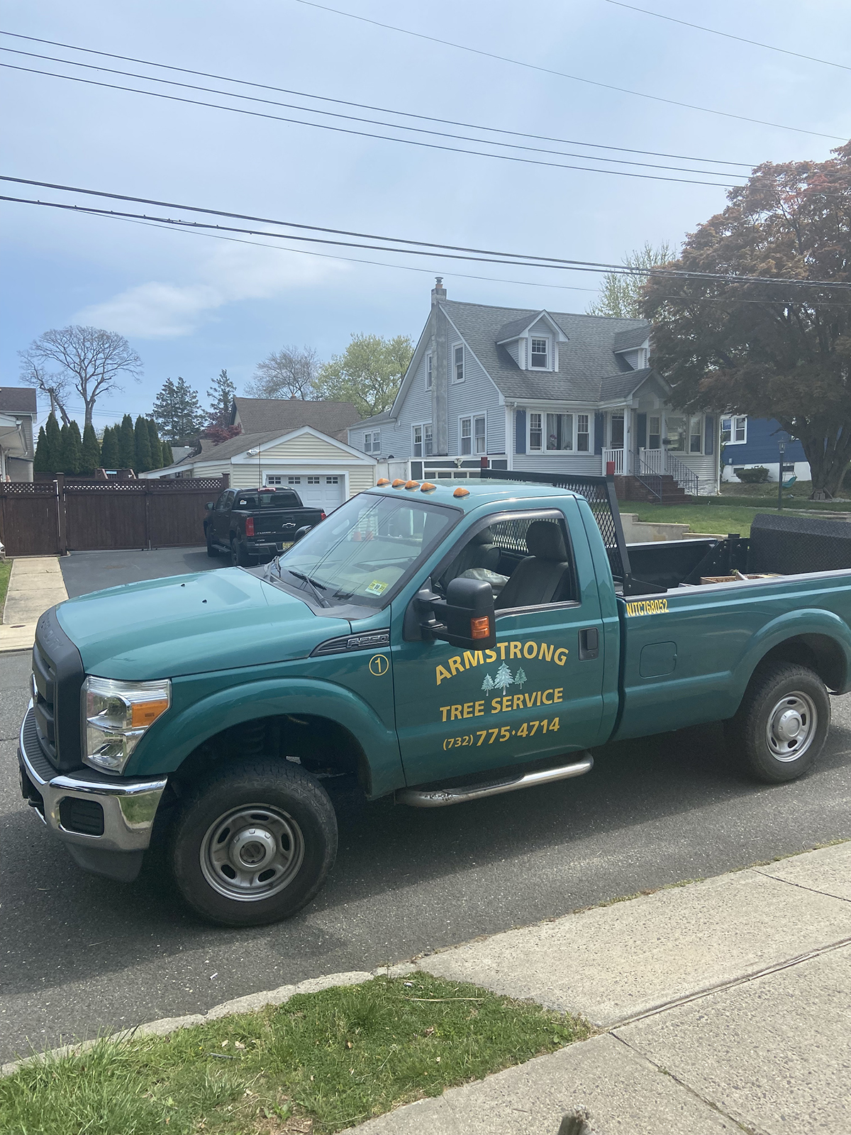 The boy and our toys Armstrong Tree Service