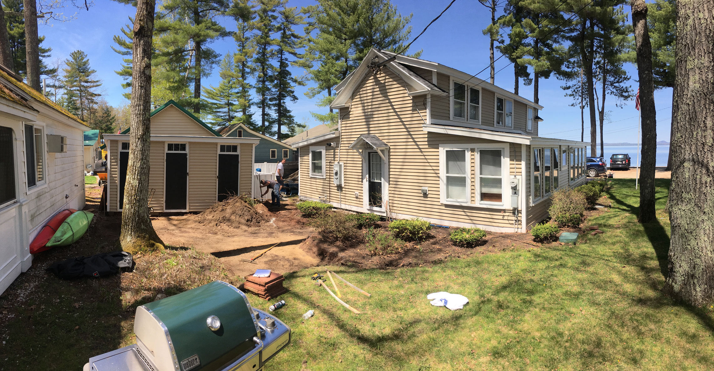 Sebago Patio with Granite Cobble Border Arrowhead Landscaping Co.