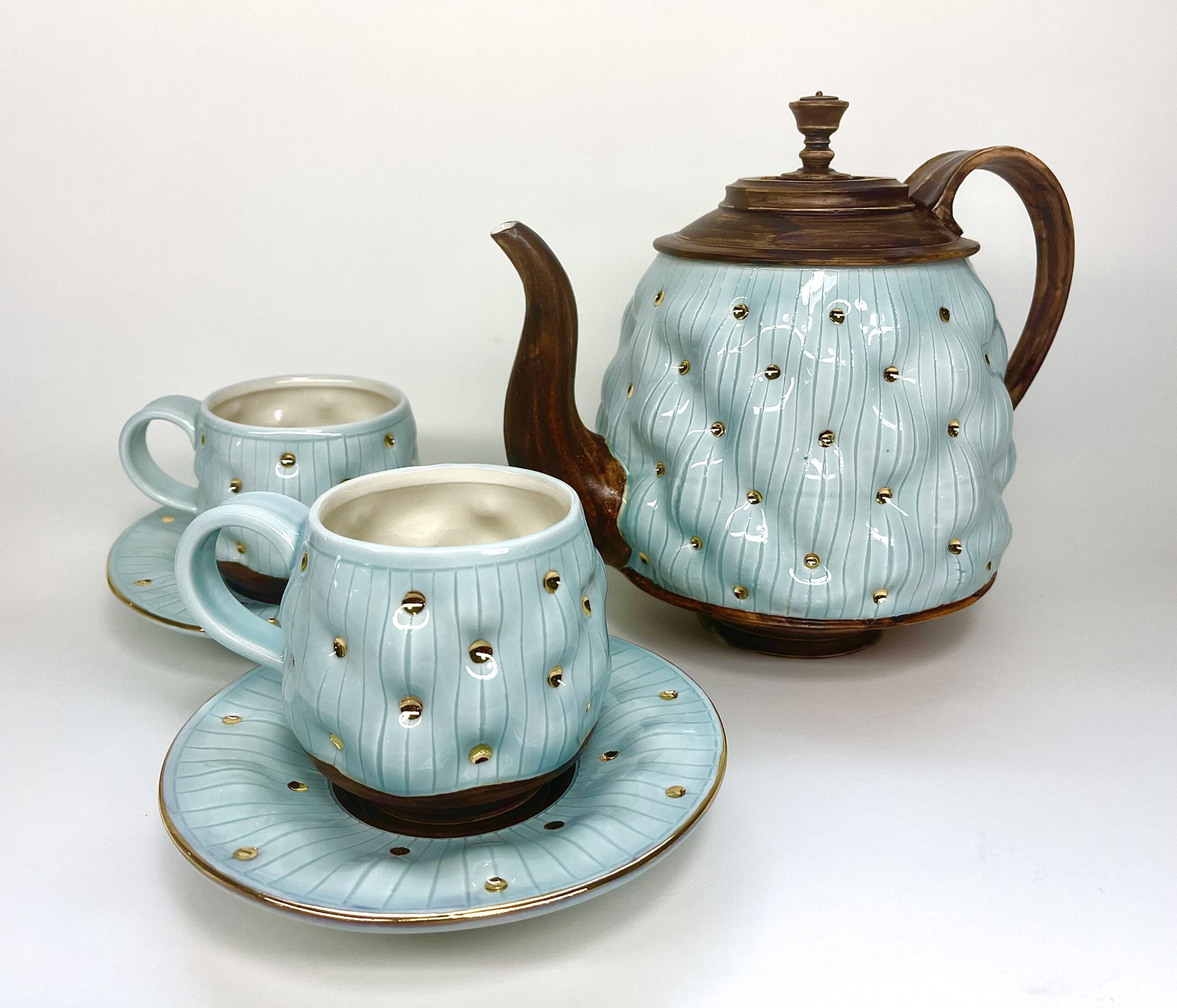 Blue Cushioned Teapot w/ Cups and Saucers •