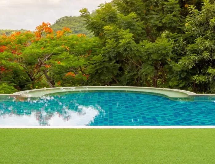 Installing Artificial Turf Around Your Pool The Cost Breakdown Artificial Grass Design
