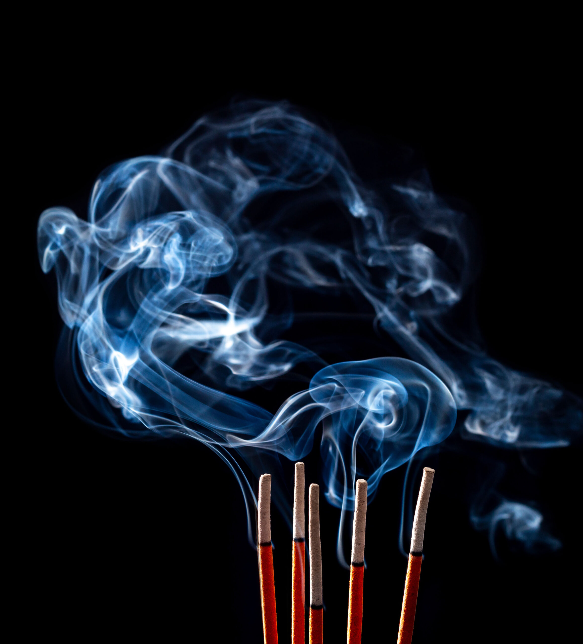 Smoking incense sticks on black background ASD Market Week