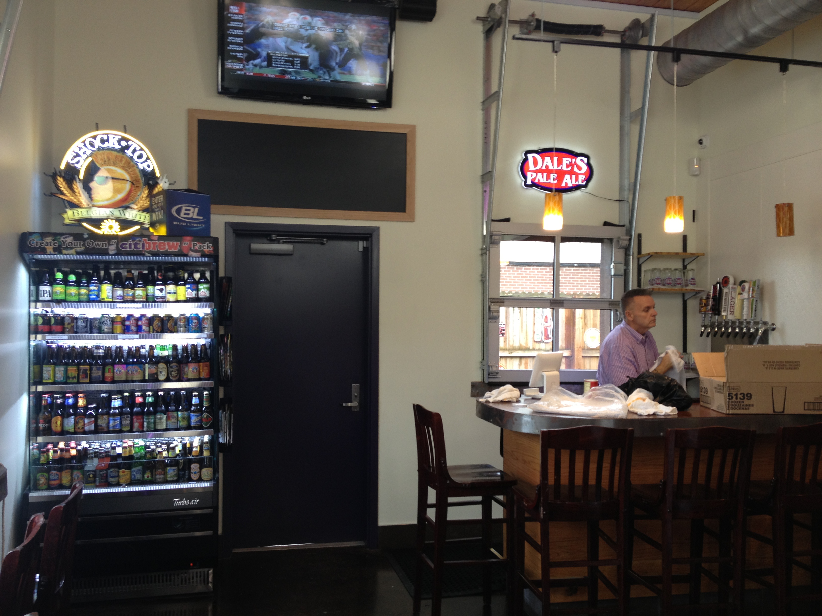 PHOTOS First day at the Brew Pump bar in a gas station on Haywood Road