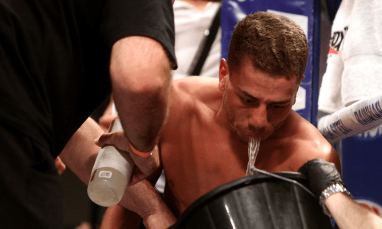 Why Do Boxers Spit Water Out Instead Of Swallowing?